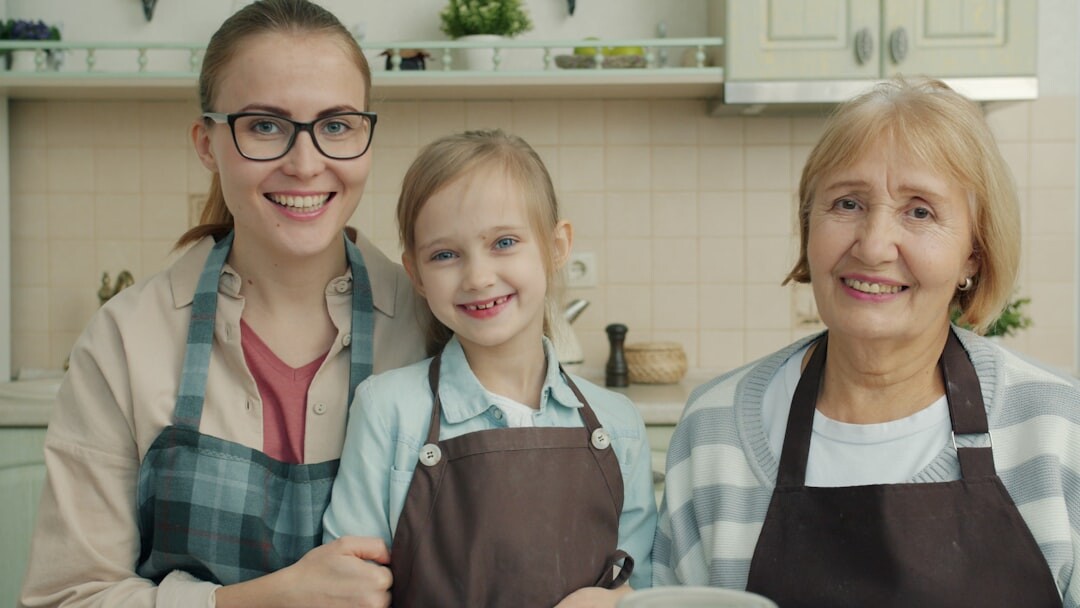 seniors and kids cooking together