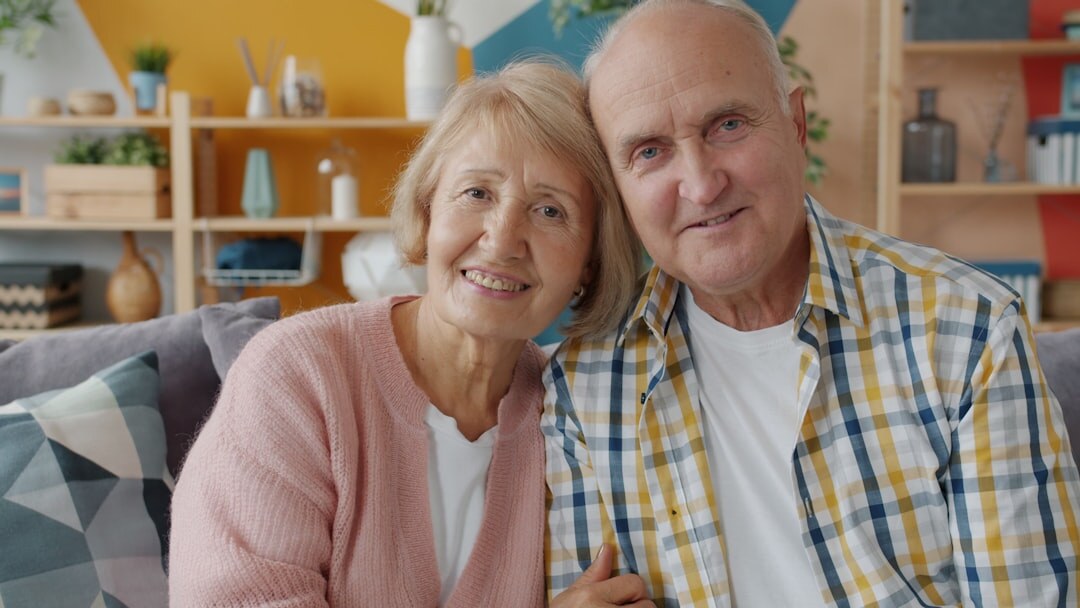 elderly couple smiling